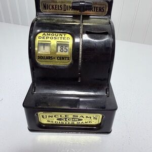 Uncle Sam's Black Metal Coin Register Bank with Yellow Accents